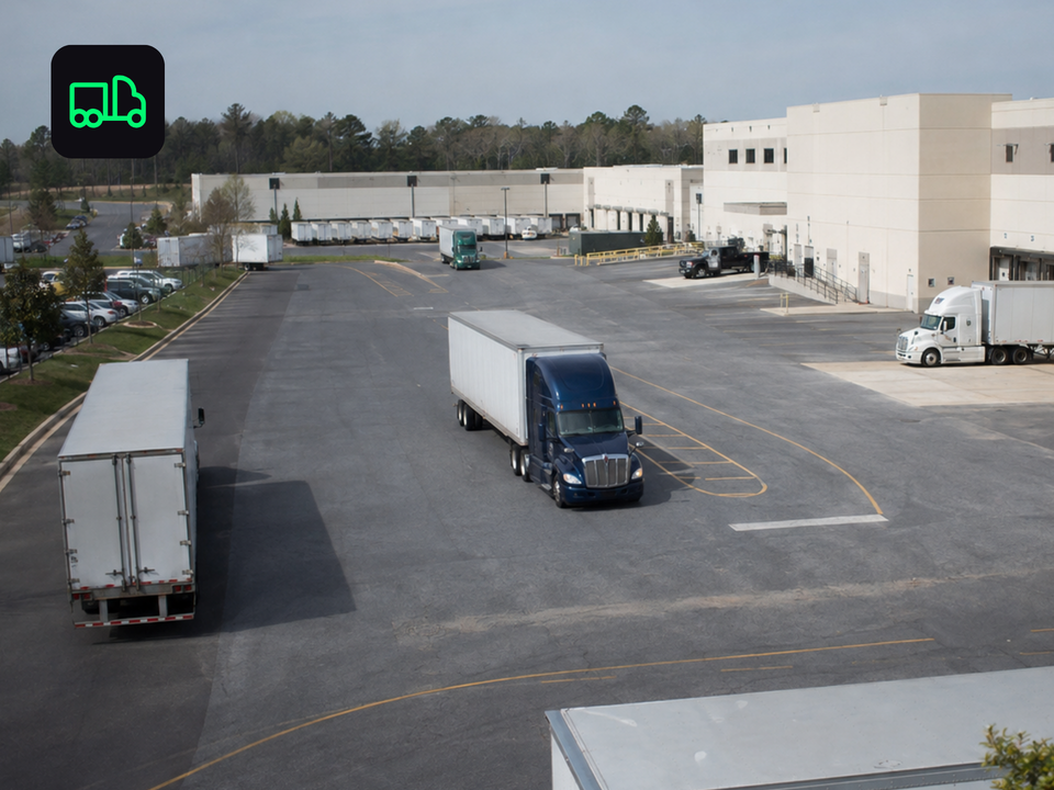 Trucking yard with trucks in motion 